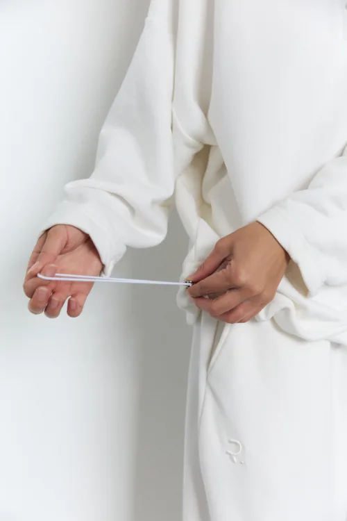 Костюм жіночий поло молочного кольору з вишивкою oversize